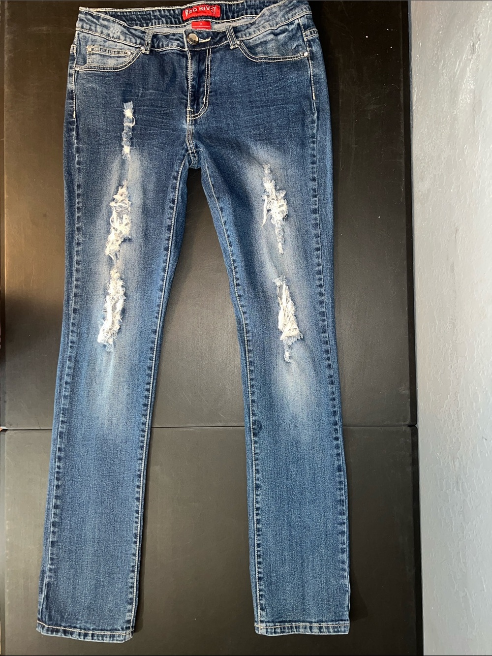 Red Rivet Women's Distressed Skinny Jeans in Medium Blue